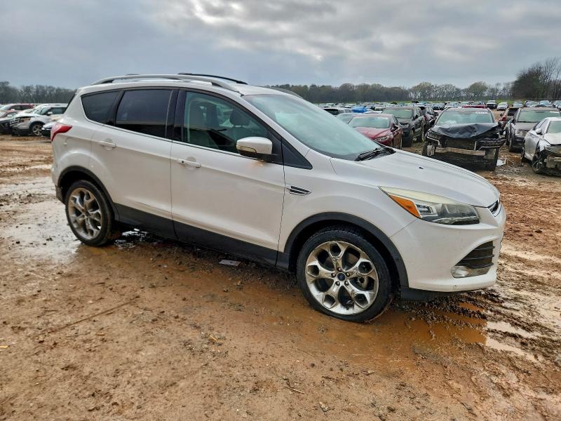 Photo 4 from auction – 2014 FORD ESCAPE TIT with VIN 1FMCU9J97EUE12351