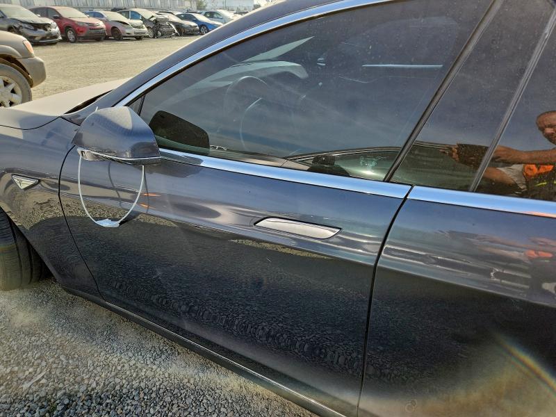 Photo 7 from auction – 2014 TESLA MODEL S with VIN 5YJSA1H2XEFP62763