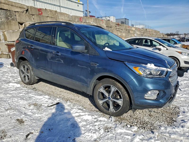 Photo 4 from auction – 2018 FORD ESCAPE SEL with VIN 1FMCU0HD5JUC74485