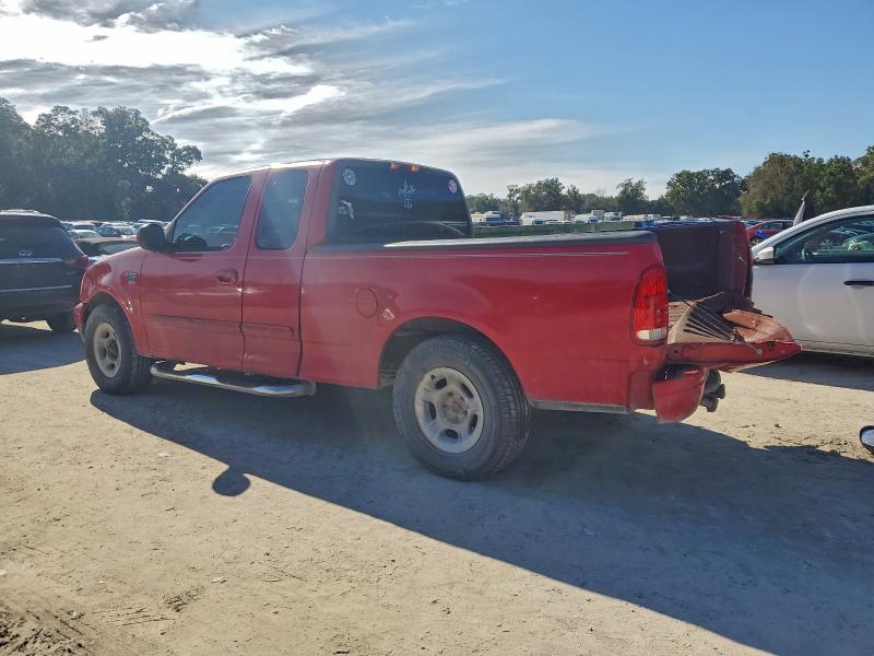 Photo 2 from auction – 1999 FORD F150 with VIN 1FTRX17W3XKB35569