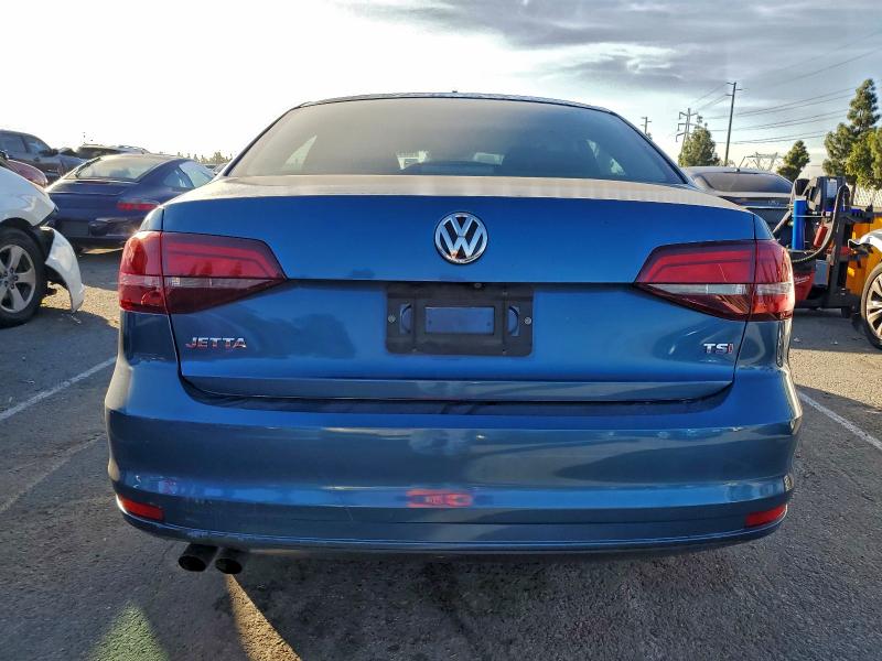 Photo 6 from auction – 2017 VOLKSWAGEN JETTA S with VIN 3VW2B7AJ3HM384591