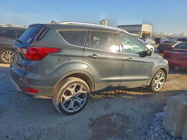 Photo 3 from auction – 2019 FORD ESCAPE with VIN 1FMCU9J95KUC32779