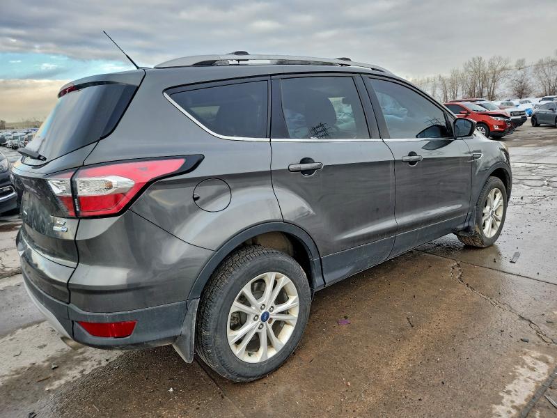 Photo 3 from auction – 2017 FORD ESCAPE SE with VIN 1FMCU9GD8HUC51167
