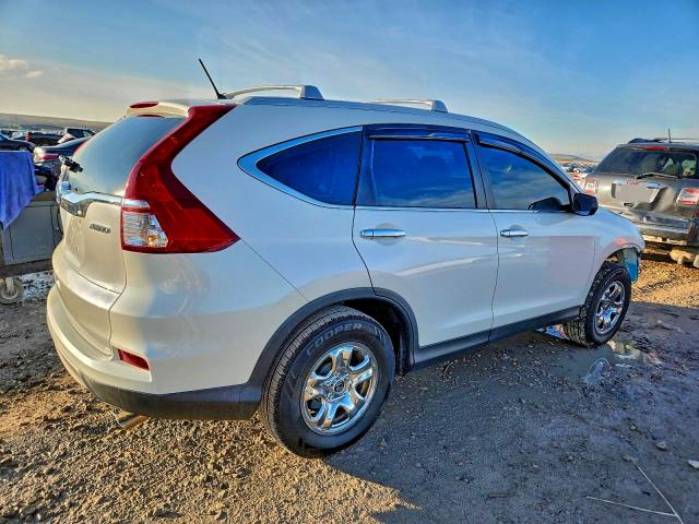 Photo 3 from auction – 2016 HONDA CR-V LX with VIN 5J6RM4H37GL042105