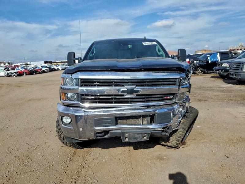 Photo 5 from auction – 2015 CHEVROLET SILVERADO with VIN 1GC1KWE85FF147114