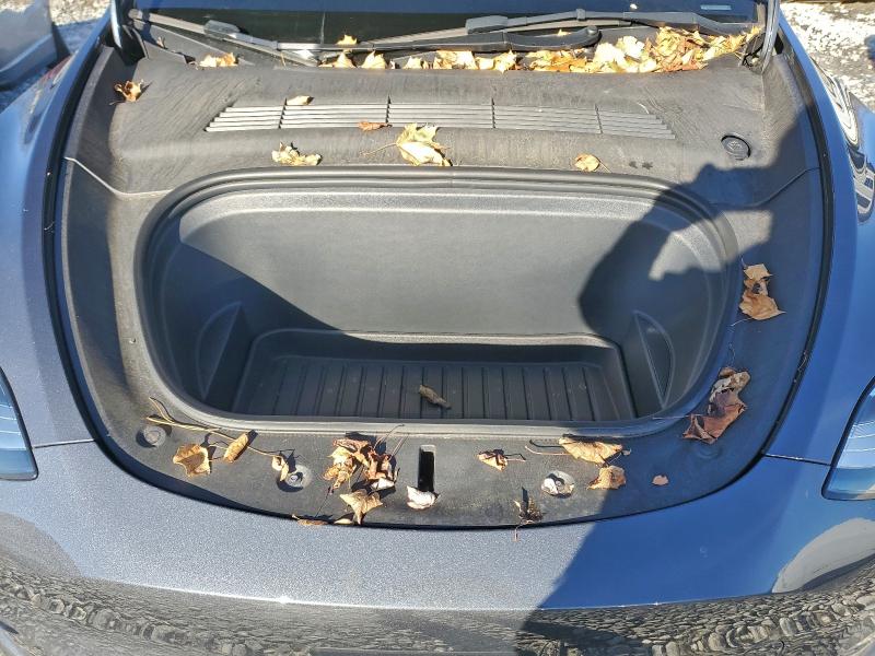 Photo 11 from auction – 2023 TESLA MODEL Y with VIN 7SAYGDEE3PA041714
