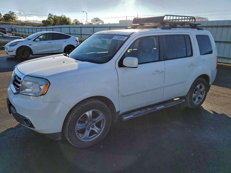 HONDA PILOT EXL 2013 with VIN 5FNYF4H55DB082582 - Photo from auction