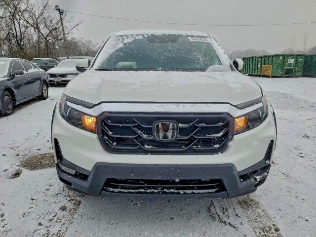 Photo 5 from auction – 2023 HONDA RIDGELINE with VIN 5FPYK3F58PB055686