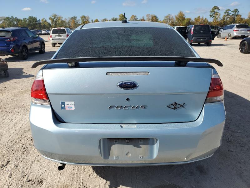 Photo 6 from auction – 2009 FORD FOCUS S with VIN 1FAHP34N89W103043