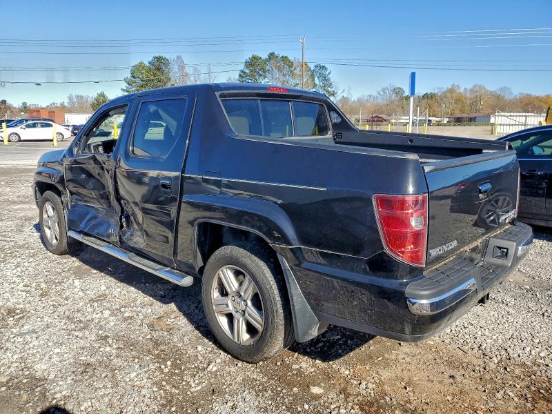 Photo 2 from auction – 2010 HONDA RIDGELINE with VIN 5FPYK1F58AB013613