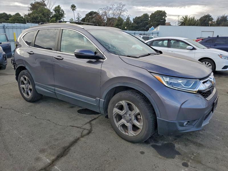 Photo 4 from auction – 2018 HONDA CR-V EX with VIN 7FARW2H50JE022136
