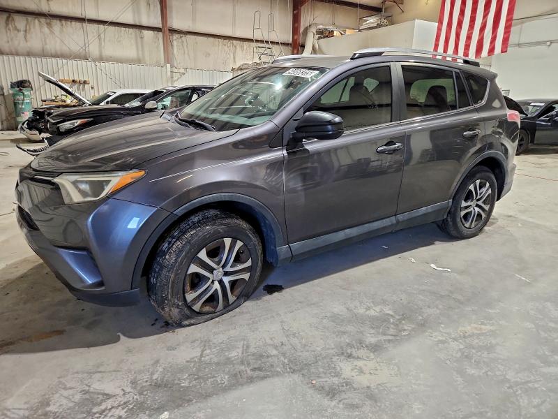 TOYOTA RAV4 LE 2017 with VIN 2T3ZFREV3HW357100 - Photo from auction