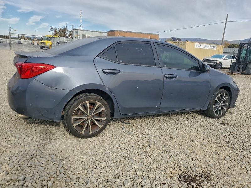 Photo 3 from auction – 2017 TOYOTA COROLLA L with VIN 5YFBURHE2HP652458