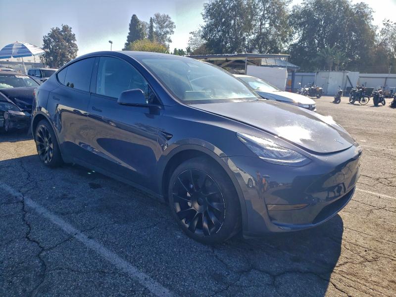 Photo 4 from auction – 2023 TESLA MODEL Y with VIN 7SAYGDEE7PA051890