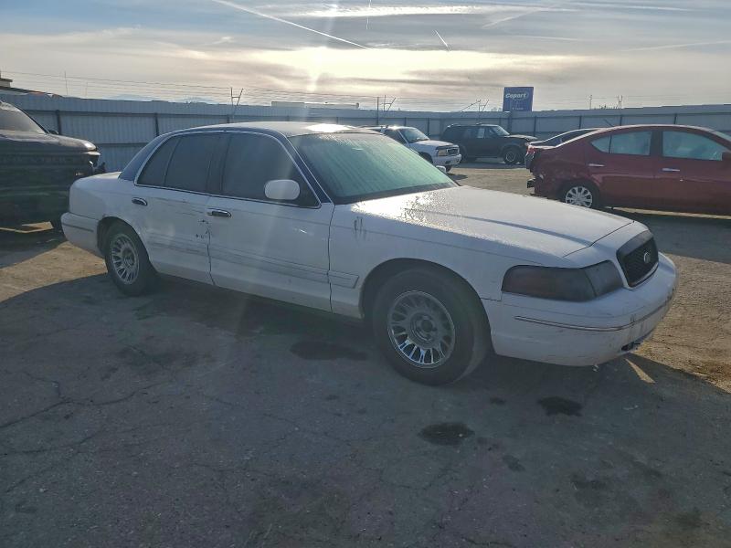 Photo 4 from auction – 2001 FORD CROWN VICT with VIN 2FAFP74W01X127823