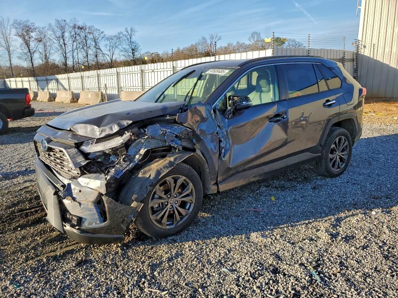 TOYOTA RAV4 LIMIT 2022 with VIN JTMD6RFV8ND520809 - Photo from auction