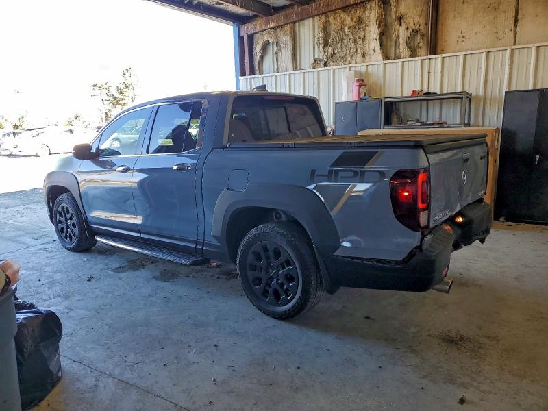 Photo 2 from auction – 2023 HONDA RIDGELINE with VIN 5FPYK3F73PB065172