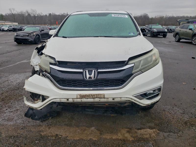 Photo 5 from auction – 2015 HONDA CR-V EX with VIN 5J6RM4H55FL009006