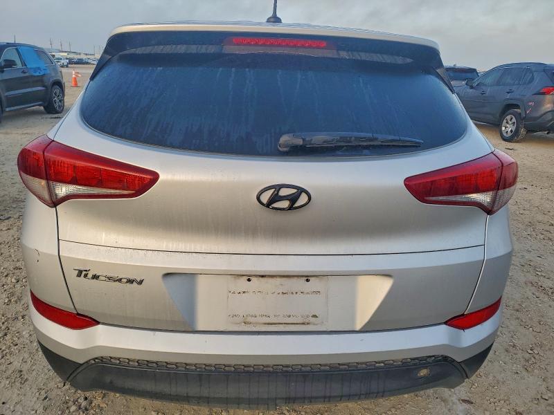 Photo 6 from auction – 2017 HYUNDAI TUCSON SE with VIN KM8J23A49HU289560