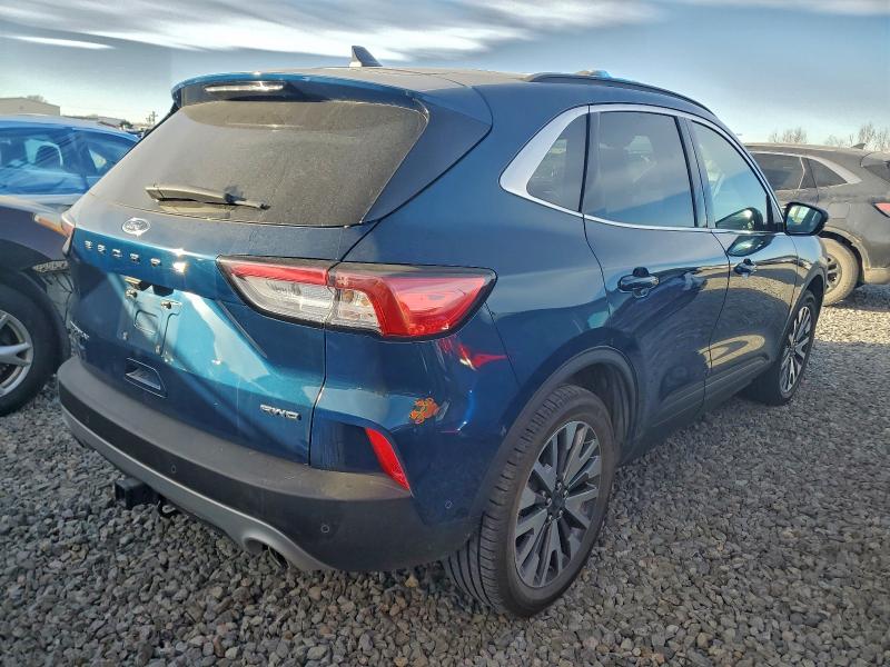 Photo 3 from auction – 2020 FORD ESCAPE TIT with VIN 1FMCU9J96LUC66019