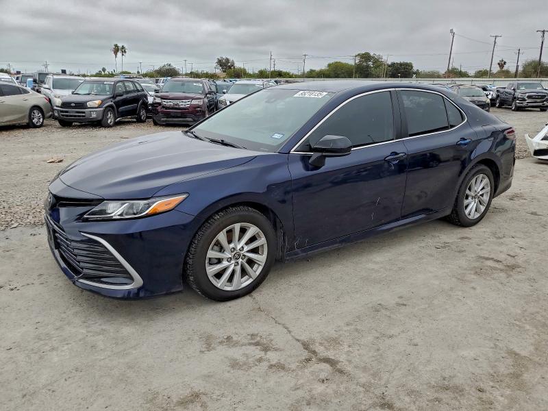 TOYOTA CAMRY LE 2022 with VIN 4T1C11AK2NU001002 - Photo from auction