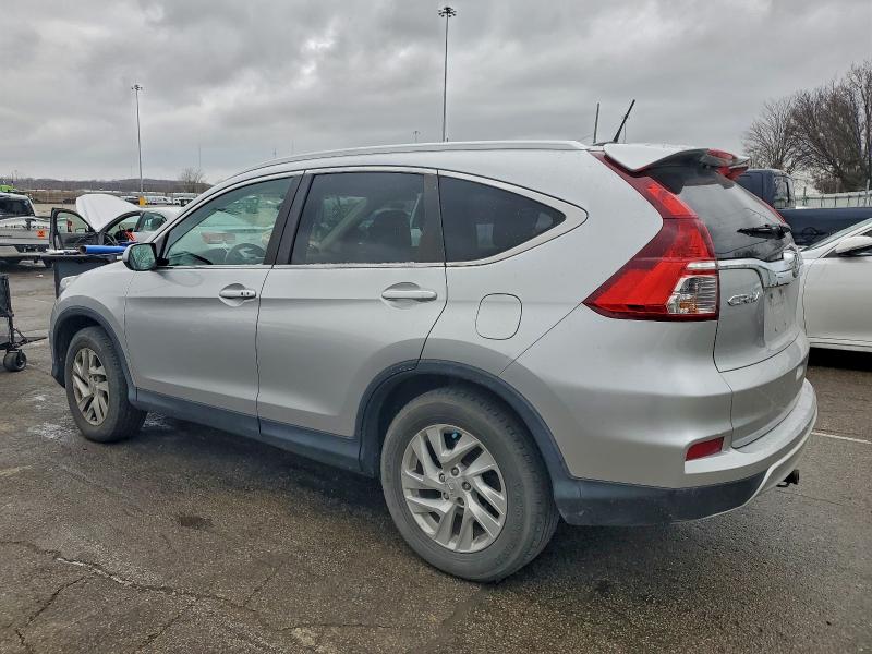 Photo 2 from auction – 2016 HONDA CR-V EXL with VIN 2HKRM4H79GH719359