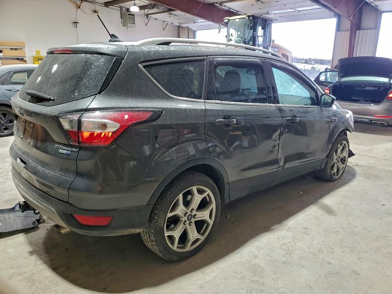 Photo 3 from auction – 2018 FORD ESCAPE TIT with VIN 1FMCU9J97JUA39922