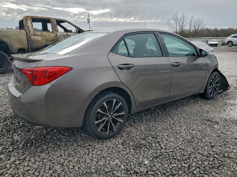 Photo 3 from auction – 2017 TOYOTA COROLLA L with VIN 5YFBURHEXHP701437
