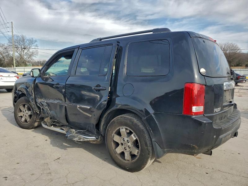 Photo 2 from auction – 2011 HONDA PILOT TOUR with VIN 5FNYF3H99BB047408