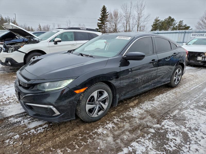HONDA CIVIC LX 2019 with VIN 2HGFC2F57KH010735 - Photo from auction