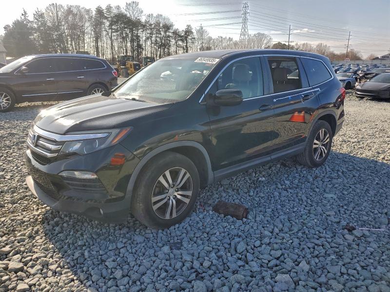 HONDA PILOT EXL 2016 with VIN 5FNYF5H50GB060063 - Photo from auction