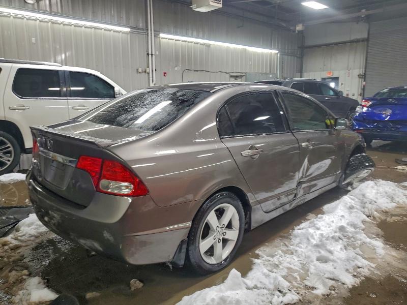 Photo 3 from auction – 2011 HONDA CIVIC LX-S with VIN 19XFA1F64BE001946