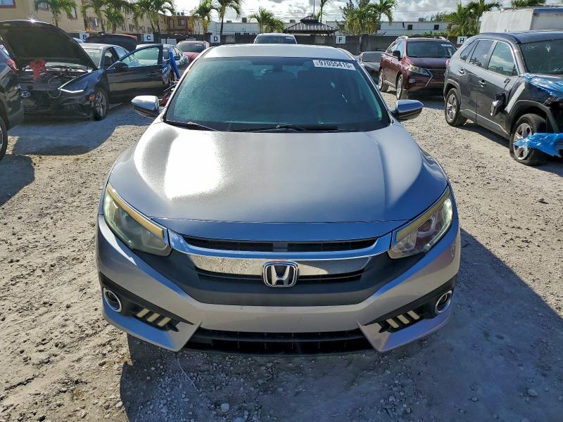 Photo 5 from auction – 2016 HONDA CIVIC LX with VIN 19XFC2F54GE071221