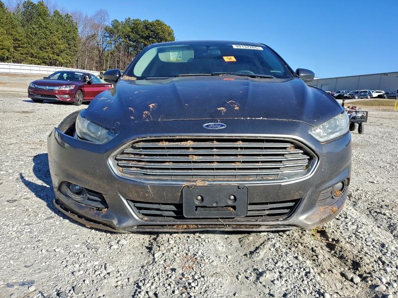 Photo 5 from auction – 2016 FORD FUSION S with VIN 3FA6P0G71GR290080