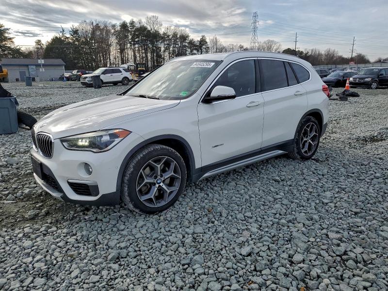 BMW X1 XDRIVE2 2017 with VIN WBXHT3Z3XH4A54912 - Photo from auction