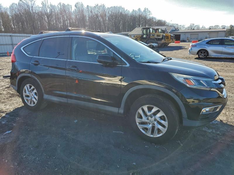 Photo 4 from auction – 2015 HONDA CR-V EXL with VIN 2HKRM4H74FH643161