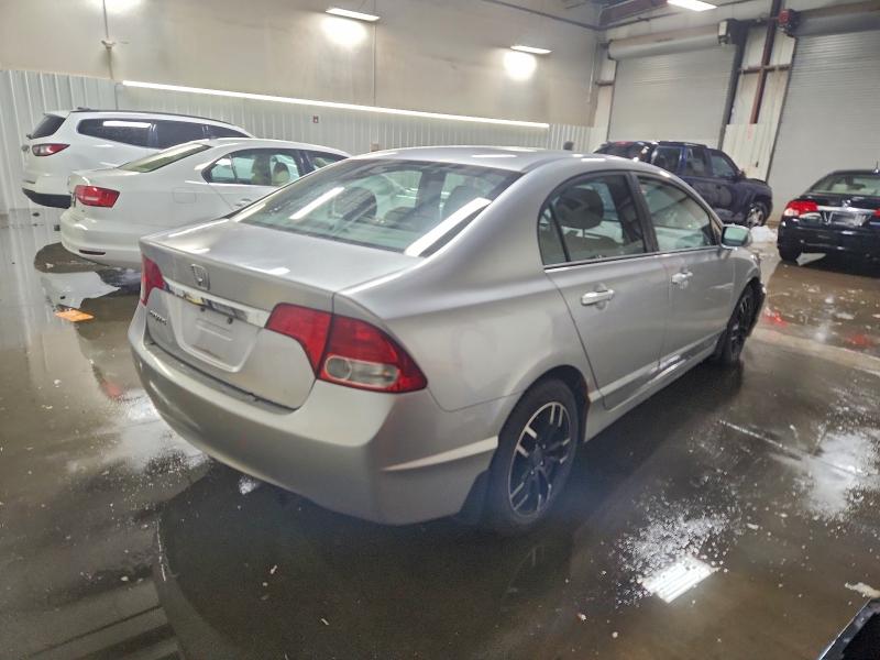 Photo 3 from auction – 2010 HONDA CIVIC EXL with VIN 19XFA1F93AE010498