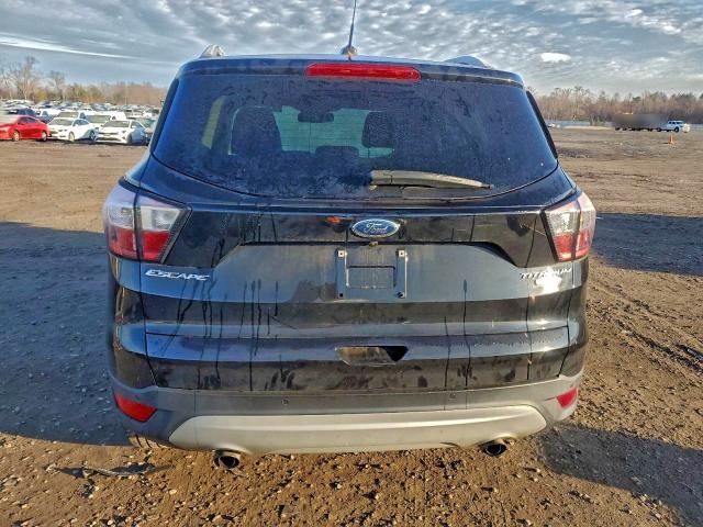 Photo 6 from auction – 2017 FORD ESCAPE TIT with VIN 1FMCU9JDXHUD68371