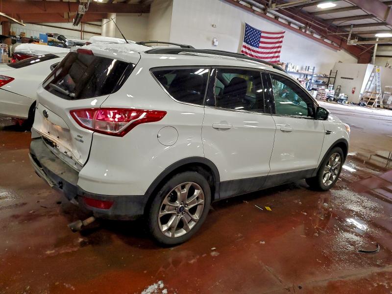 Photo 3 from auction – 2016 FORD ESCAPE SE with VIN 1FMCU9G99GUA96851