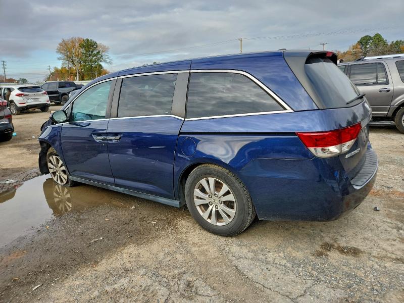 Photo 2 from auction – 2016 HONDA ODYSSEY with VIN 5FNRL5H60GB110692